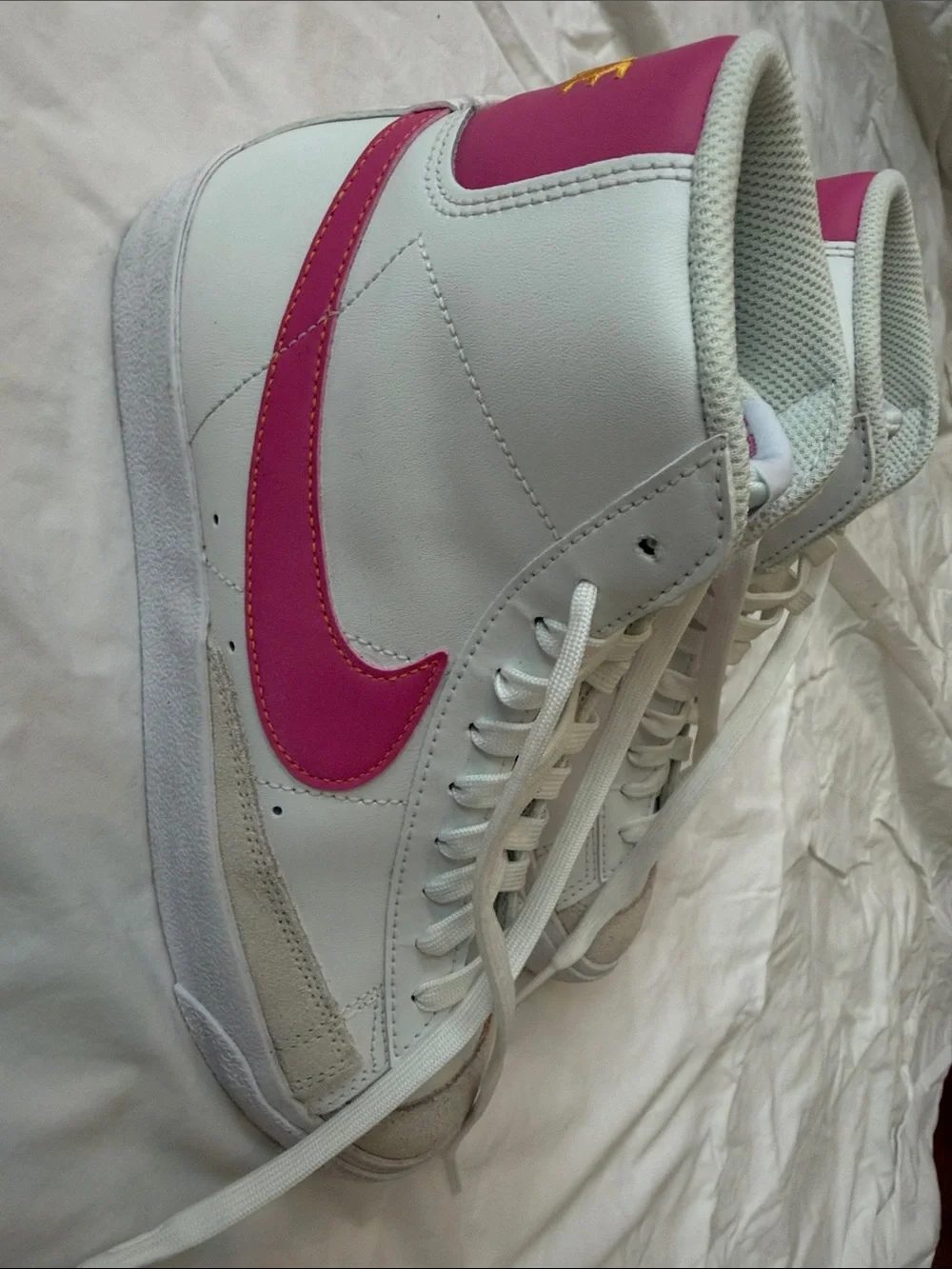 Nike Blazers High-Top Sneakers with Pink Swoosh Accents and Yellow “Nike”
